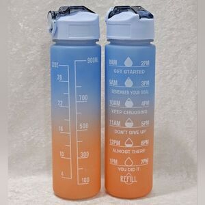 Set of two, 32oz ombre water bottles. Encouraging messages on 1 side.
